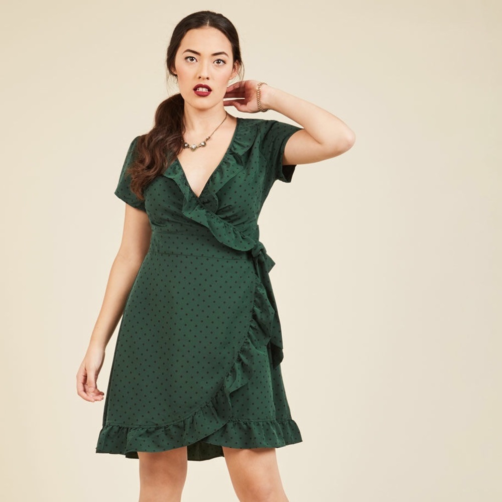 Ruffle and bustle wrap dress